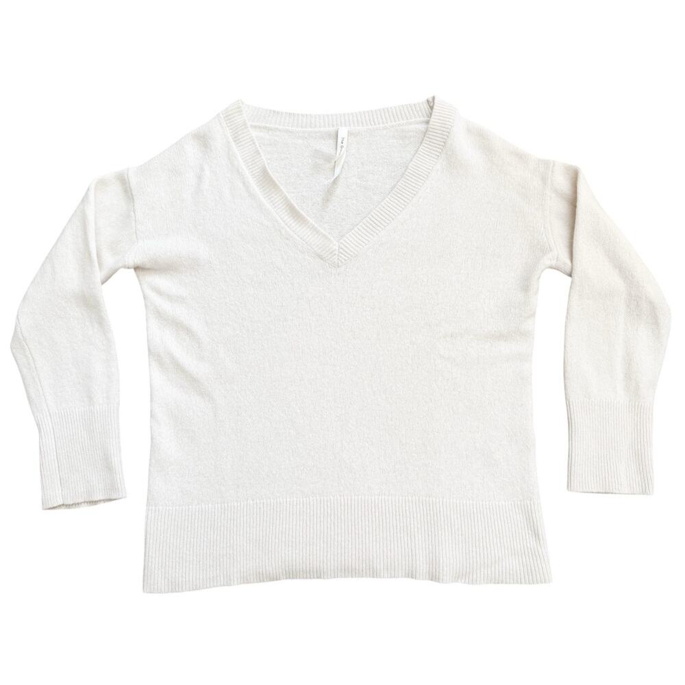 The Group Babaton Cashmere Sweater V Neck Cream Minimalist Basics Aritzia